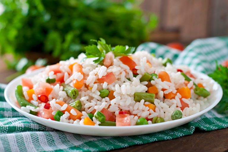 Salad with rice and there is a tone